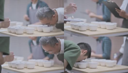 3名亚洲华裔男咖啡师品酒师表演杯咖啡，品尝杯咖啡后在剪贴板上写下高清在线视频素材下载