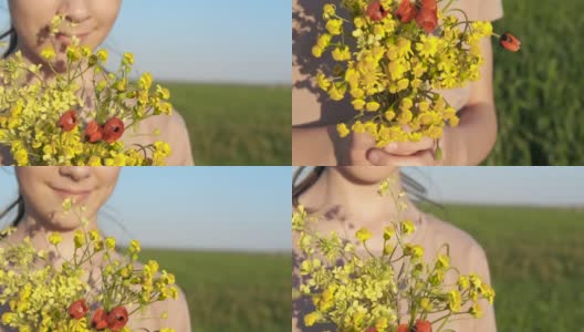 一个女孩手中的一束野花。高清在线视频素材下载