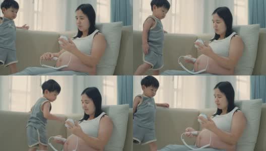 孕妇听着宝宝和她的心跳高清在线视频素材下载