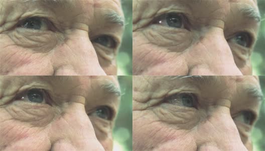 悲伤的老人肖像:一个老人眼睛的特写肖像高清在线视频素材下载