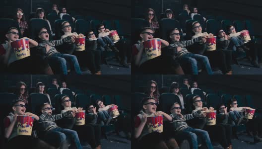 五个男孩在电影院看3D电影高清在线视频素材下载