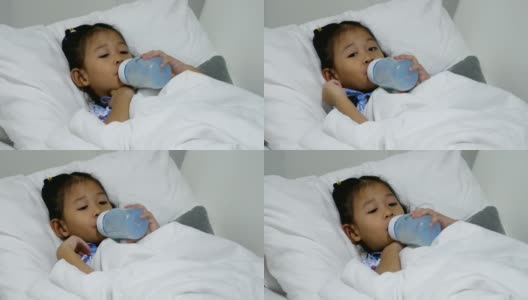 孩子吸奶瓶高清在线视频素材下载