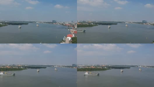 鸟瞰图左全景泰国湾，货轮，Phra Samut Chedi和拉玛九桥Samutprakarn，泰国。高清在线视频素材下载