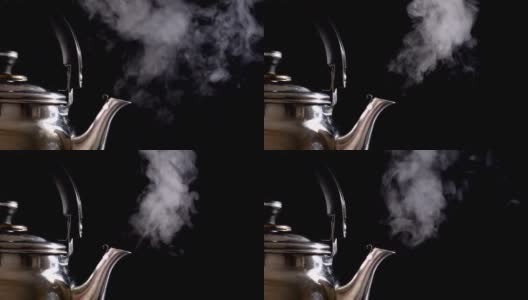 开水在茶壶中以蒸汽，动作缓慢高清在线视频素材下载
