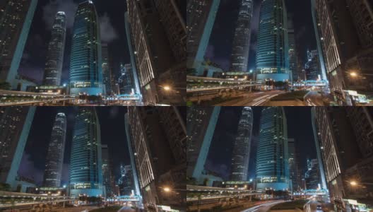 在香港现代建筑背景下，城市交通的灯光轨迹随着时间推移而变化高清在线视频素材下载