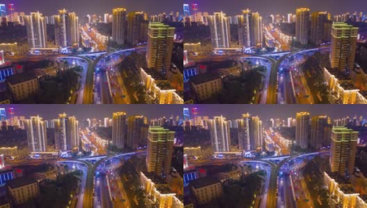 夜光青岛市中心交通街道路口航拍时间全景4k中国高清在线视频素材下载