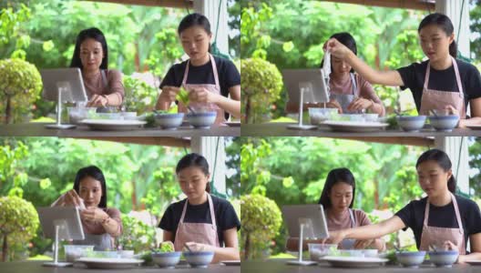两个亚洲女人一起做越南春卷高清在线视频素材下载