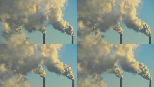 吸烟的工厂烟囱。环境问题:大城市的环境和空气污染问题。气候变化、生态和全球变暖。天空弥漫着有毒物质的烟雾。烟尘从工厂高清在线视频素材下载