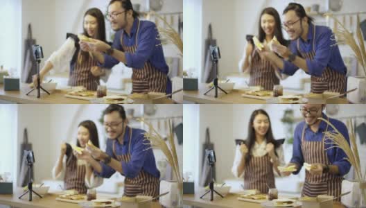 亚洲夫妇视频直播在厨房做三明治高清在线视频素材下载