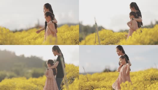 亚洲女孩走在黄花中高清在线视频素材下载