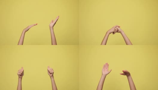 两只手臂在旋转，倾斜，拍手，互相摩擦，在黄色的背景上竖起大拇指高清在线视频素材下载