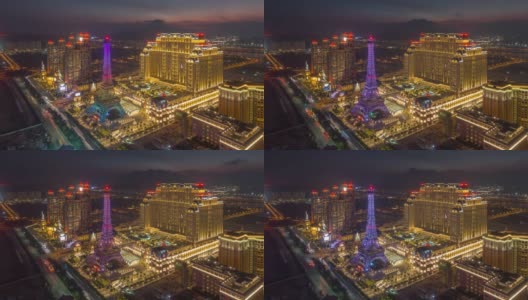 日落之夜，照亮著名的澳门湾酒店屋顶全景，4k时间跨度的中国高清在线视频素材下载