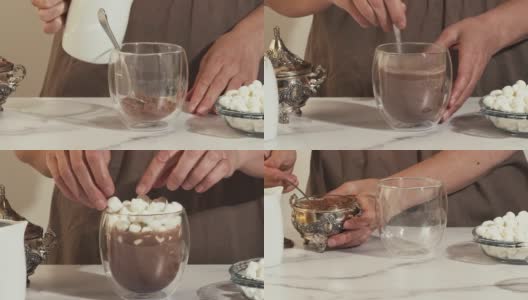 热巧克力和棉花糖近距离大理石背景。女人正在准备热巧克力和棉花糖，特写加速视频，循环播放高清在线视频素材下载