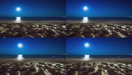 夜晚的海景，海岸线和月亮的延时视频高清在线视频素材下载