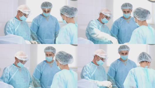 手术小组在手术室进行手术高清在线视频素材下载
