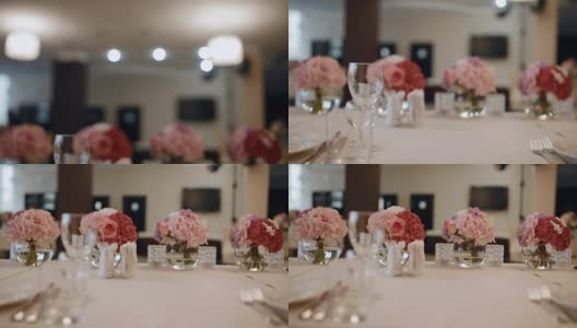 观赏精心装饰的婚宴餐桌高清在线视频素材下载