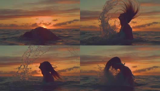 剪影:女孩把她的头从海洋中抽打出来，在夕阳下泼水。高清在线视频素材下载