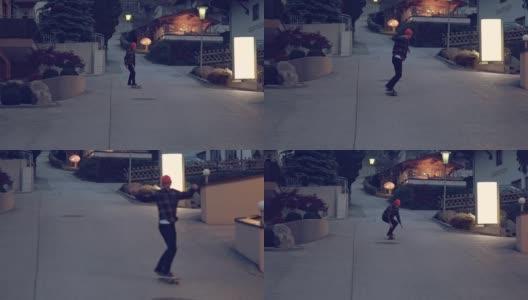一个玩滑板的年轻人。跳跃和技巧高清在线视频素材下载