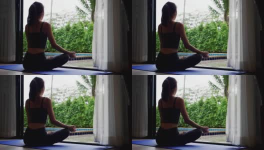 亚洲女性以苗条的身材在家练习瑜伽，积极健康的生活方式理念高清在线视频素材下载