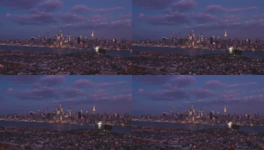 曼哈顿中城的城市天际线和霍博肯之夜。鸟瞰图。美国高清在线视频素材下载