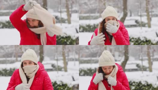 年轻女子感到寒冷，在寒冷和下雪的冬日高清在线视频素材下载