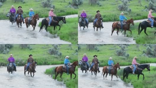 一群美国牛仔骑马穿过美国犹他州一条河的视频高清在线视频素材下载