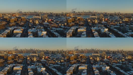 美国纽约市布鲁克林海军造船厂和威廉斯堡住宅区上空的曼哈顿，阳光明媚的冬日黎明。无人机视频与复杂的电影向后平移相机运动。高清在线视频素材下载