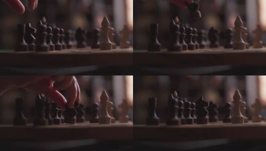 特写侧视图的不认识的女性手移动黑马在棋盘游戏。高清在线视频素材下载