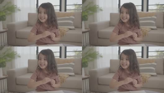 快乐混血亚洲女孩在家，儿童健康养生理念高清在线视频素材下载