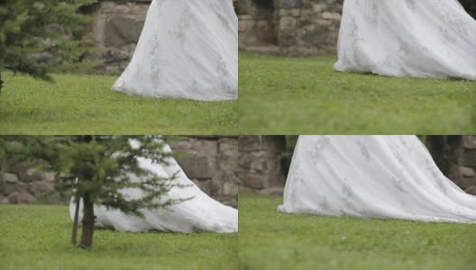 新娘在花园里散步高清在线视频素材下载