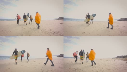海滩上的冲浪者4K高清在线视频素材下载