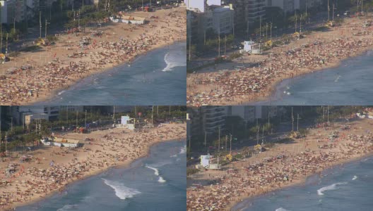 从空中俯瞰拥挤的伊帕内玛海滩，巴西里约热内卢高清在线视频素材下载