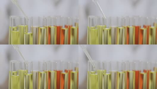 生化研究，科学家把血清滴在玻璃试管里，美容高清在线视频素材下载