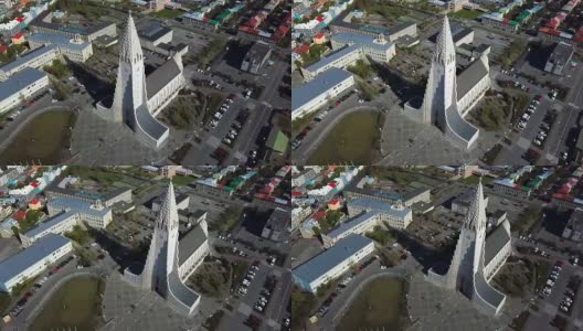 雷克雅未克Hallgrimskirkja教堂概述冰岛雷克雅未克现代建筑。空中视频。从上到下。空中无人机视频。令人惊叹的市中心视野飞行。高清在线视频素材下载