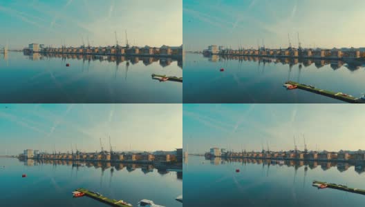 鸟瞰图的东伦敦码头和泰晤士河在一个晴朗的蓝天高清在线视频素材下载