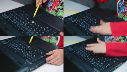 一个男孩弄坏了电脑键盘的键。高清在线视频素材下载