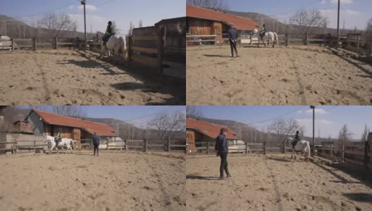 一名十几岁的男性志愿者，在动物救援中心教游客如何骑马，努力为他们召唤出自然和动物之间的关系高清在线视频素材下载