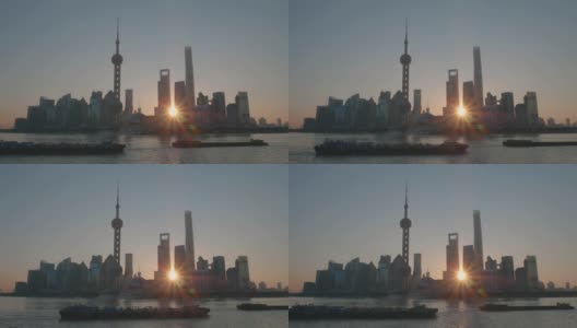 陆家嘴金融区，黄浦江和过往船只在阳光明媚的早晨。上海,中国。远景高清在线视频素材下载
