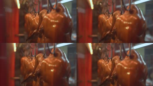 慢动作拍摄的一个咖啡馆的窗口和著名的传统中国烤鸭高清在线视频素材下载