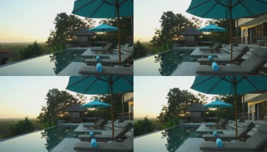 日出淘金的豪华别墅物业与游泳池高清在线视频素材下载