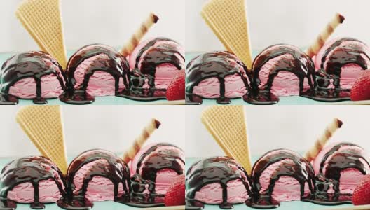 草莓冰淇淋，上面有新鲜的草莓和装饰高清在线视频素材下载