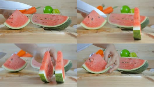 近距离拍摄的女人的手用菜刀切熟西瓜木板上的夏天新鲜水果高清在线视频素材下载