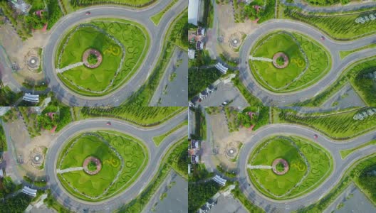 鸟瞰图交通圈，环岛与绿色花园在拉贾帕克公园，清迈，泰国。高清在线视频素材下载