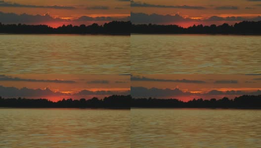 彩色日落的河与太阳和橙色的云高清在线视频素材下载
