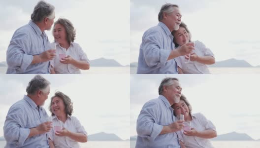 一个老人和他的妻子在沙滩上开迷你派对。有生活方式、情感和退休观念的人。高清在线视频素材下载