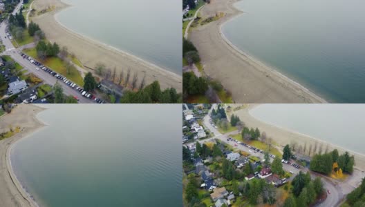从上往下看温哥华阴天的房屋、海滩和停放的汽车高清在线视频素材下载