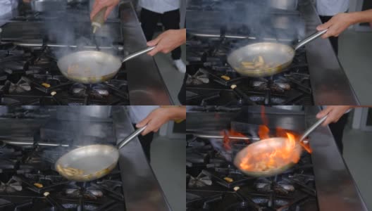 近距离的厨师sautéing鸡在锅在餐厅高清在线视频素材下载