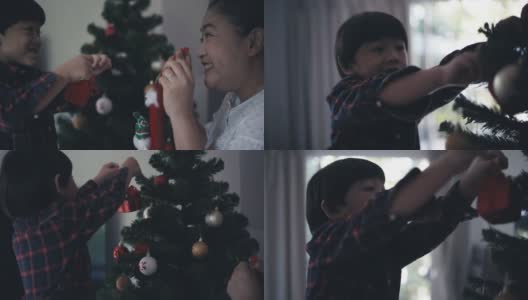 家人装饰圣诞树高清在线视频素材下载