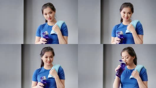 中等近距离的肖像微笑亚洲妇女疲惫后锻炼喝水从瓶子高清在线视频素材下载