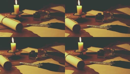 在烛光下用旧羽毛笔写在羊皮纸上高清在线视频素材下载